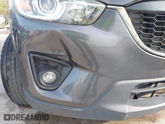 2014 Mazda CX-5 Grand Touring with VIN JM3KE2DY7E0345742, listed as a IAAI auction lot 41864116 with 158,746 mi miles. Bid and sale history available at carsss.com. Image 6.