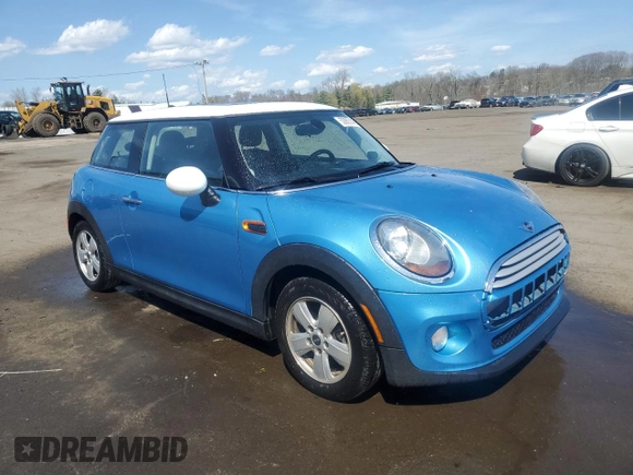 2015 MINI Hardtop with VIN WMWXM5C51FT941503, listed as a Copart auction lot 52903145 with 92,425 mi miles and Salvage Title. Bid and sale history available at DreamBid. Image 4.