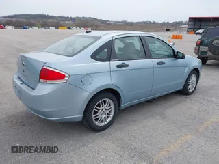 2009 Ford Focus SE with VIN 1FAHP35N59W157060, listed as a IAAI auction lot 41871757 with 141,558 mi miles. Bid and sale history available at carsss.com. Image 4.