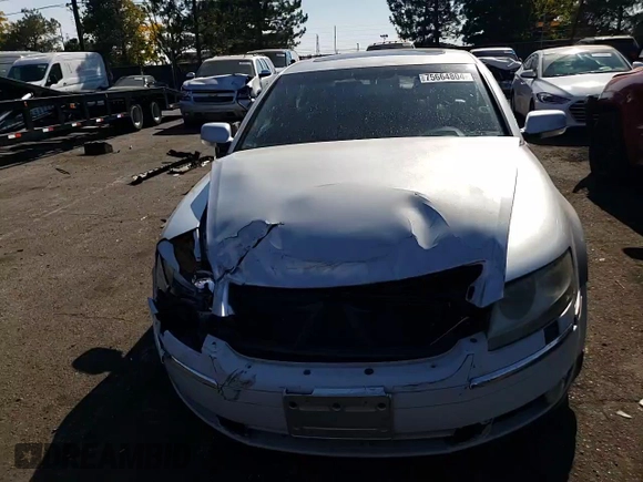 2004 Volkswagen Phaeton V8 z VIN WVWAF63D348008461, wystawiony jako Copart lot #75664804 z przebiegiem 207 769 mil mil oraz Szkoda całkowita • Salvage title. Historia ofert i sprzedaży dostępna na DreamBid. Obrazek 11.