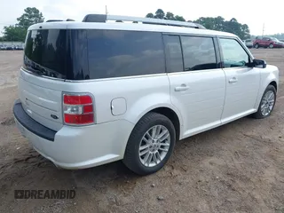 2014 Ford Flex SEL z VIN 2FMGK5C8XEBD00203, wystawiony jako IAAI lot #42304671 z przebiegiem 109 639 mil mil oraz . Historia ofert i sprzedaży dostępna na DreamBid. Obrazek 4.