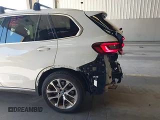 2022 BMW X5 xDrive40i with VIN 5UXCR6C09N9M21945, listed as a IAAI auction lot 42170363 with 23,537 mi miles and . Bid and sale history available at DreamBid. Image 6.