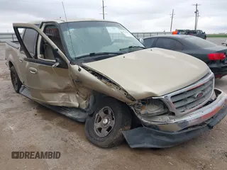 2001 Ford F-150 XLT with VIN 1FTRW07W01KE20427, listed as a IAAI auction lot 42144195 with Not provided miles and . Bid and sale history available at DreamBid. Image 1.