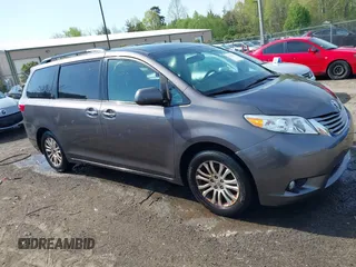 2015 Toyota Sienna XLE with VIN 5TDYK3DC9FS685768, listed as a IAAI auction lot 42062942 with 132,242 mi miles. Bid and sale history available at carsss.com. Image 13.