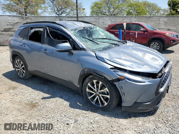 2022 Toyota Corolla Cross XLE with VIN 7MUEAAAG3NV012240, listed as a Copart auction lot 54125225 with 16,204 mi miles and Salvage title. Bid and sale history available at DreamBid. Image 4.