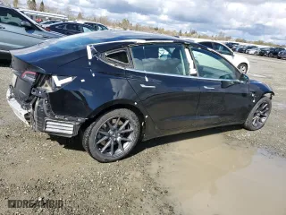 2019 Tesla Model 3 Long Range with VIN 5YJ3E1EB3KF208747, listed as a Copart auction lot 47947305 with 126,516 mi miles and Salvage Title. Bid and sale history available at carsss.com. Image 3.