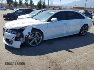 2018 Audi A8 Sport z VIN WAU43AFD9JN000377, wystawiony jako Copart lot #65799615 z przebiegiem 33 902 mil mil oraz Szkoda całkowita • Salvage title. Historia ofert i sprzedaży dostępna na DreamBid. Obrazek 1.