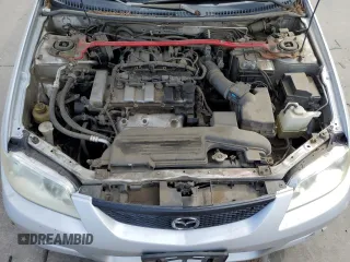 2003 Mazda Protege z VIN JM1BJ245931158925, wystawiony jako Copart lot #60086785 z przebiegiem 347 952 mil mil oraz Czysty tytuł • Clean title. Historia ofert i sprzedaży dostępna na DreamBid. Obrazek 12.