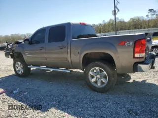 2013 GMC Sierra 1500 SLT with VIN 3GTP2WE71DG236708, listed as a Copart auction lot 50181885 with 205,620 mi miles and Salvage title. Bid and sale history available at DreamBid. Image 2.