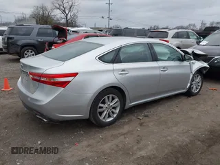 2014 Toyota Avalon Limited with VIN 4T1BK1EB8EU133085, listed as a IAAI auction lot 40949898 with 126,697 mi miles. Bid and sale history available at carsss.com. Image 4.