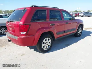 2006 Jeep Grand Cherokee Laredo with VIN 1J4HR48N56C112794, listed as a IAAI auction lot 42008002 with 207,065 mi miles. Bid and sale history available at carsss.com. Image 4.