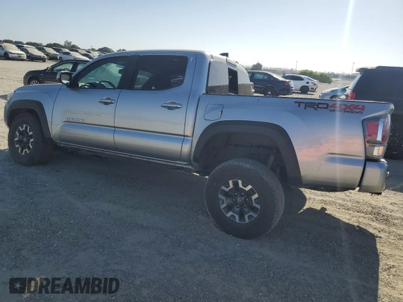 2023 Toyota Tacoma SR with VIN 3TMCZ5AN3PM645372, listed as a Copart auction lot 59917365 with 27,146 mi miles and Salvage title. Bid and sale history available at DreamBid. Image 2.