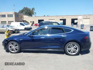 2014 Tesla Model S 60 with VIN 5YJSA1H12EFP46760, listed as a IAAI auction lot 42344596 with 106,252 mi miles and . Bid and sale history available at DreamBid. Image 14.