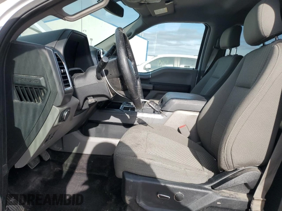2015 Ford F-150 XLT with VIN 1FTEW1EP9FKD67783, listed as a Copart auction lot 42984415 with 146,549 mi miles and Salvage title. Bid and sale history available at DreamBid. Image 7.