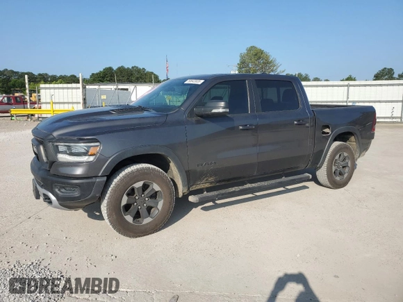 2020 Ram 1500 Rebel with VIN 1C6SRFLT4LN144723, listed as a Copart auction lot 59843935 with 90,936 mi miles and Salvage title. Bid and sale history available at DreamBid. Image 1.
