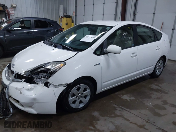 2008 Toyota Prius z VIN JTDKB20UX83407612, wystawiony jako IAAI lot #41141030 z przebiegiem 240 479 mil mil oraz . Historia ofert i sprzedaży dostępna na DreamBid. Obrazek 17.