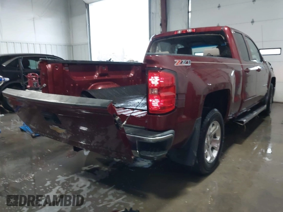2015 Chevrolet Silverado 1500 LT with VIN 1GCVKREC1FZ184196, listed as a IAAI auction lot 41246741 with 108,028 mi miles and . Bid and sale history available at DreamBid. Image 4.
