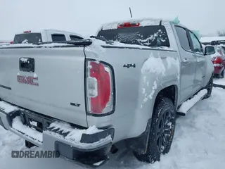 2015 GMC Canyon 4WD SLT with VIN 1GTG6CE36F1257975, listed as a IAAI auction lot 41607688 with 127,523 mi miles. Bid and sale history available at carsss.com. Image 4.