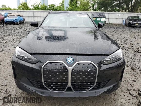 2024 BMW i4 eDrive35 with VIN WBY43AW05RFS84773, listed as a Copart auction lot 54974024 with 2,942 mi miles and Salvage Title. Bid and sale history available at carsss.com. Image 5.