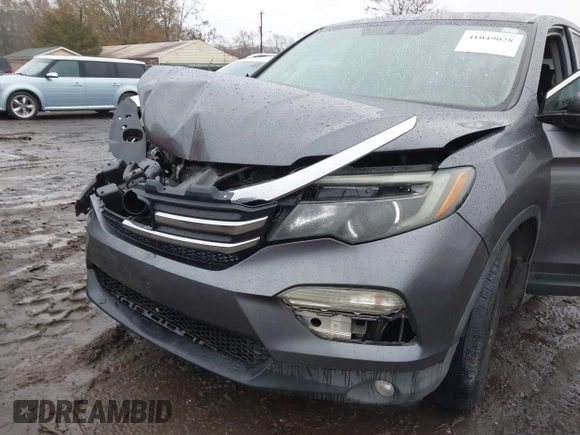 2017 Honda Pilot EX-L with VIN 5FNYF5H8XHB018480, listed as a IAAI auction lot 41049028 with 136,748 mi miles and . Bid and sale history available at DreamBid. Image 6.