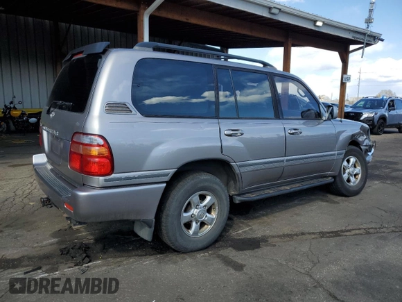 2002 Toyota Land Cruiser z VIN JTEHT05J522027452, wystawiony jako Copart lot #51141595 z przebiegiem 278 465 mil mil oraz Szkoda całkowita • Salvage title. Historia ofert i sprzedaży dostępna na DreamBid. Obrazek 3.