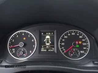 2011 Volkswagen Tiguan SE with VIN WVGBV7AX2BW513647, listed as a IAAI auction lot 41660772 with 86,042 mi miles and . Bid and sale history available at DreamBid. Image 7.