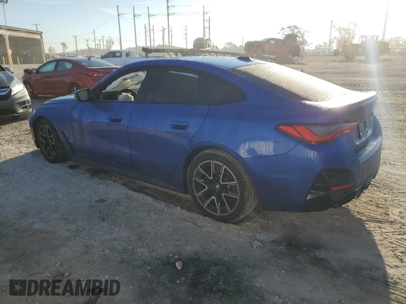 2022 BMW 4 Series M440i xDrive с VIN WBA13AW00NFL94612, выставлен на аукционе Copart как лот 76690314 с пробегом Не указан миль и Списание • Salvage title. История ставок и продаж доступна на DreamBid. Изображение 2.