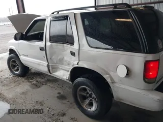 2004 Chevrolet Blazer LS z VIN 1GNDT13X64K129093, wystawiony jako IAAI lot #41860109 z przebiegiem 175 588 mil mil oraz . Historia ofert i sprzedaży dostępna na DreamBid. Obrazek 6.