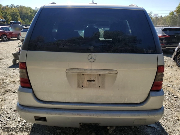 2001 Mercedes-Benz M-Class with VIN 4JGAB54E81A274037, listed as a Copart auction lot 76555544 with 202,446 mi miles and Salvage Title. Bid and sale history available at carsss.com. Image 6.
