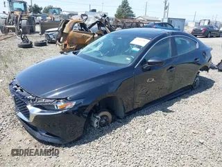 2024 Mazda 3 S Preferred with VIN 3MZBPACM5RM415895, listed as a IAAI auction lot 42496907 with Not provided miles and . Bid and sale history available at DreamBid. Image 2.