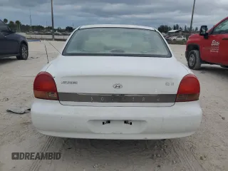2000 Hyundai Sonata GLS with VIN KMHWF35V0YA347621, listed as a Copart auction lot 76346874 with 164,489 mi miles and Salvage Title. Bid and sale history available at carsss.com. Image 6.
