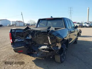 2020 Honda Ridgeline RTL with VIN 5FPYK3F52LB024816, listed as a IAAI auction lot 42103344 with 68,700 mi miles and . Bid and sale history available at DreamBid. Image 4.