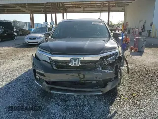 2019 Honda Pilot Touring 8-Passenger z VIN 5FNYF5H97KB007291, wystawiony jako Copart lot #47608765 z przebiegiem 70 758 mil mil oraz Szkoda całkowita • Salvage title. Historia ofert i sprzedaży dostępna na DreamBid. Obrazek 14.