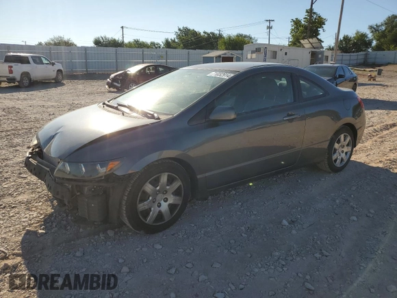 2010 Honda Civic Cpe LX with VIN 2HGFG1B67AH527237, listed as a Copart auction lot 71032914 with 184,842 mi miles and Salvage Title. Bid and sale history available at carsss.com. Image 1.