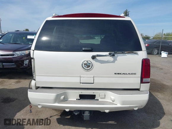 2005 Cadillac Escalade z VIN 1GYEC63N25R200026, wystawiony jako IAAI lot #41761210 z przebiegiem 226 747 mil mil oraz . Historia ofert i sprzedaży dostępna na DreamBid. Obrazek 17.