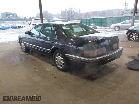 1997 Cadillac Seville Luxury SLS with VIN 1G6KS52YXVU816736, listed as a IAAI auction lot 41854220 with 107,091 mi miles. Bid and sale history available at carsss.com. Image 3.