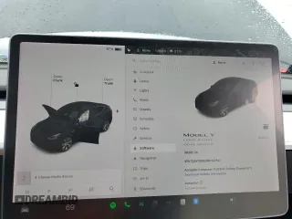 2022 Tesla Model Y Long Range z VIN 7SAYGDEE0NF327147, wystawiony jako Copart lot #58422885 z przebiegiem 39 021 mil mil oraz Szkody całkowita. Historia ofert i sprzedaży dostępna na DreamBid. Obrazek 9.