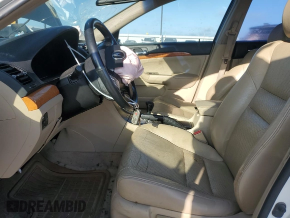2004 Acura TSX w/Navigation with VIN JH4CL969X4C021469, listed as a Copart auction lot 60602785 with 201,623 mi miles and Salvage title. Bid and sale history available at DreamBid. Image 7.