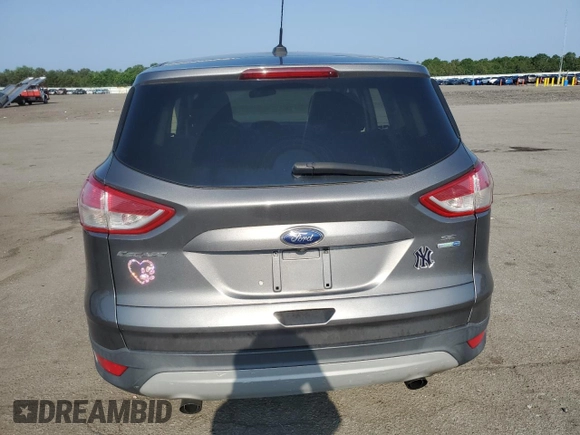 2014 Ford Escape SE z VIN 1FMCU9G97EUB34302, wystawiony jako Copart lot #61692815 z przebiegiem 158 068 mil mil oraz Czysty tytuł • Clean title. Historia ofert i sprzedaży dostępna na DreamBid. Obrazek 6.