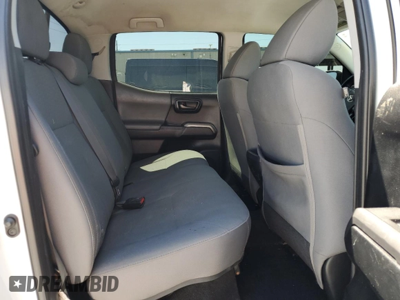 2017 Toyota Tacoma SR5 z VIN 5TFDZ5BN0HX025190, wystawiony jako Copart lot #53604695 z przebiegiem 163 039 mil mil oraz Szkoda całkowita • Salvage title. Historia ofert i sprzedaży dostępna na DreamBid. Obrazek 10.