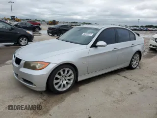 2007 BMW 3 Series 328i with VIN WBAVA375X7NL15565, listed as a Copart auction lot 56133315 with 227,456 mi miles and Salvage title. Bid and sale history available at DreamBid. Image 1.