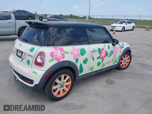 2012 MINI Hardtop S with VIN WMWSV3C54CTY17815, listed as a IAAI auction lot 42061906 with 72,393 mi miles and . Bid and sale history available at DreamBid. Image 4.