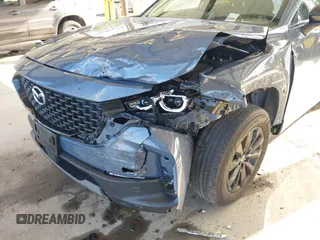2023 Mazda CX-50 S Select with VIN 7MMVABAM2PN110674, listed as a IAAI auction lot 42014100 with 36,827 mi miles and . Bid and sale history available at DreamBid. Image 6.
