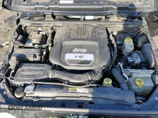 2015 Jeep Wrangler Unlimited Sahara with VIN 1C4BJWEG3FL530114, listed as a Copart auction lot 88851565 with 156,669 mi miles and Salvage Title. Bid and sale history available at carsss.com. Image 12.