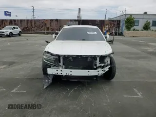 2015 Dodge Charger SXT z VIN 2C3CDXHG7FH721601, wystawiony jako Copart lot #58253925 z przebiegiem 123 004 mil mil oraz Szkoda całkowita • Salvage title. Historia ofert i sprzedaży dostępna na DreamBid. Obrazek 14.