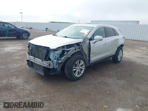 2020 Cadillac XT5 Premium Luxury AWD with VIN 1GYKNDRS4LZ178042, listed as a IAAI auction lot 41583102 with 87,085 mi miles and . Bid and sale history available at carsss.com. Image 2.