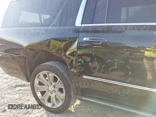 2019 GMC Yukon XL Denali with VIN 1GKS2HKJ2KR226275, listed as a IAAI auction lot 41552828 with 82,069 mi miles. Bid and sale history available at carsss.com. Image 6.