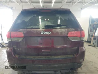 2016 Jeep Grand Cherokee Laredo z VIN 1C4RJFAG3GC471619, wystawiony jako IAAI lot #41659523 z przebiegiem 139 671 mil mil oraz . Historia ofert i sprzedaży dostępna na DreamBid. Obrazek 16.