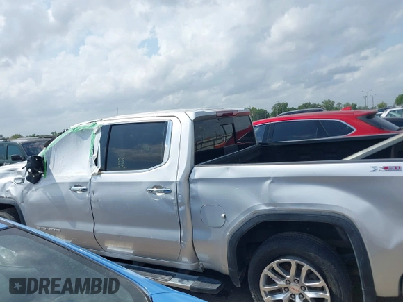 2020 GMC Sierra 1500 SLT z VIN 3GTU9DED9LG299417, wystawiony jako IAAI lot #42168562 z przebiegiem Nie podano mil oraz . Historia ofert i sprzedaży dostępna na DreamBid. Obrazek 14.