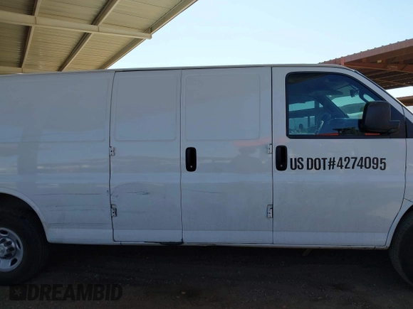 2020 Chevrolet Express Cargo Van with VIN 1GCWGBFP8L1120262, listed as a IAAI auction lot 42010679 with 114,589 mi miles. Bid and sale history available at carsss.com. Image 13.